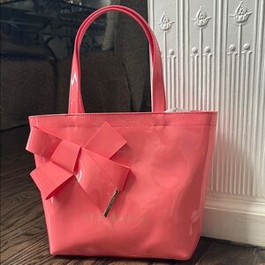 Ted Baker Pink Tote Bag
10” bottom, 13” top 10” high 4” wide at bottom